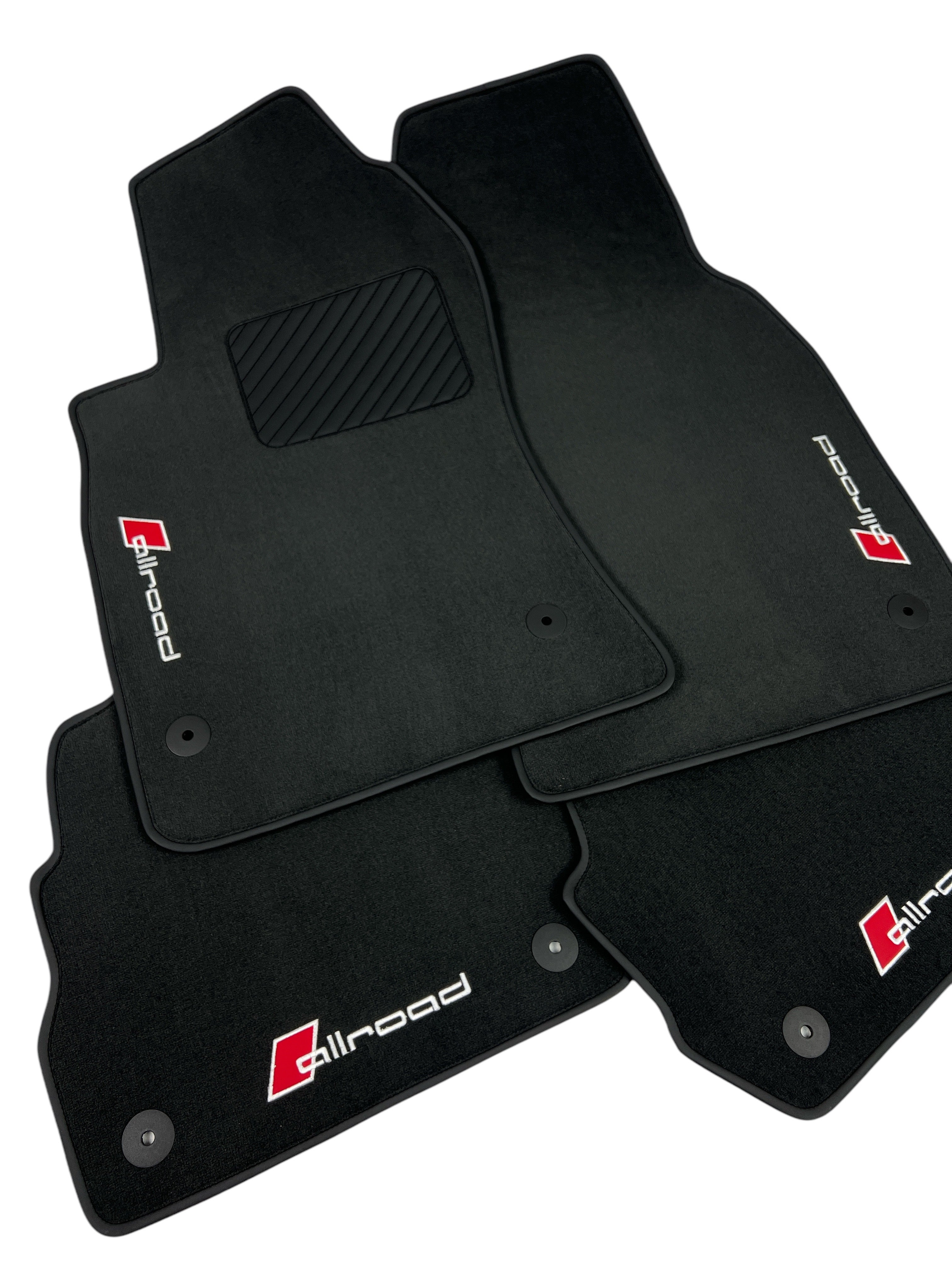 Premium custom pile mats for all Audi. Black carpets with brown edging, color number three, embroidered with the word Allroad in brown letters on black, square to be made black inside