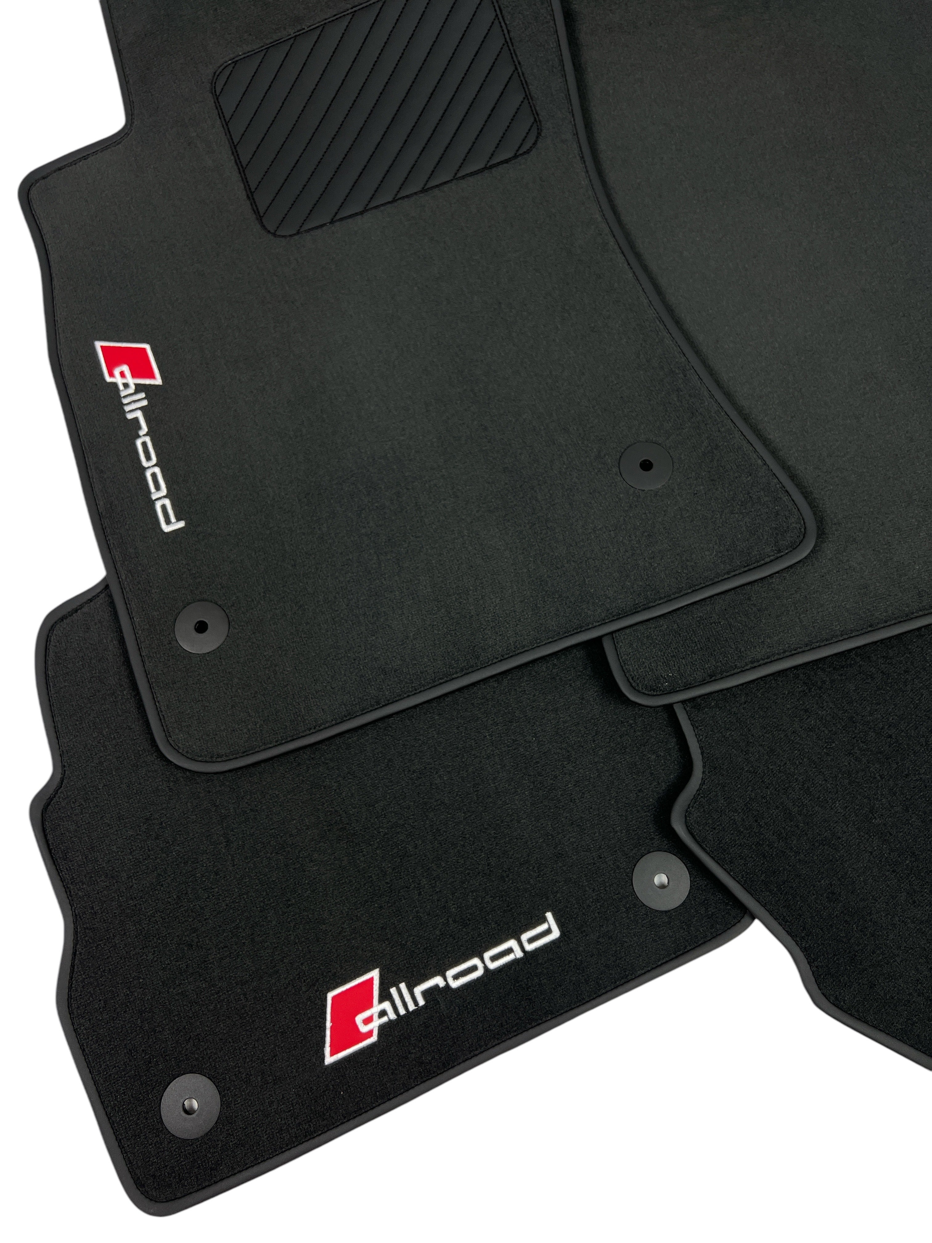 Premium custom pile mats for all Audi. Black carpets with brown edging, color number three, embroidered with the word Allroad in brown letters on black, square to be made black inside